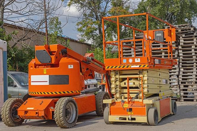 productive forklift operation in a busy warehouse space in Florence